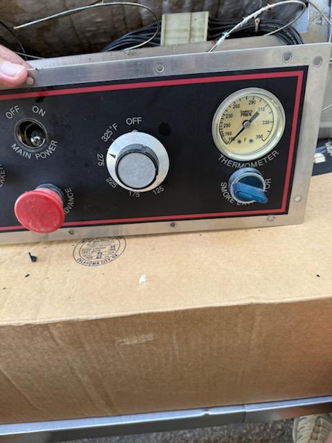 Southern Pride control panel with old style chrome-ring main power switch, temperature dial, and thermometer gauge