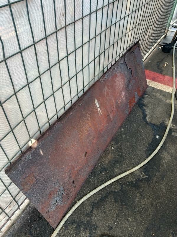 Full view of the rusted air deflector panel removed from an XLR-1400 cooking cabinet