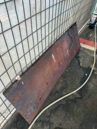 Full view of the rusted air deflector panel removed from an XLR-1400 cooking cabinet