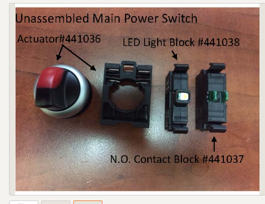 Unassembled new style main power switch parts laid out: actuator, LED light block, and N.O. contact block with part numbers labeled